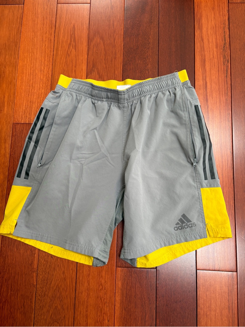 adidas Men's Gray and Yellow Athletic Shorts with Side Stripes